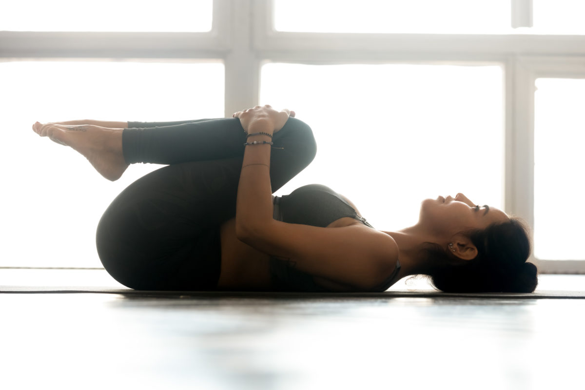 Yoga Collective - Knees to Chest Pose – Apanasana