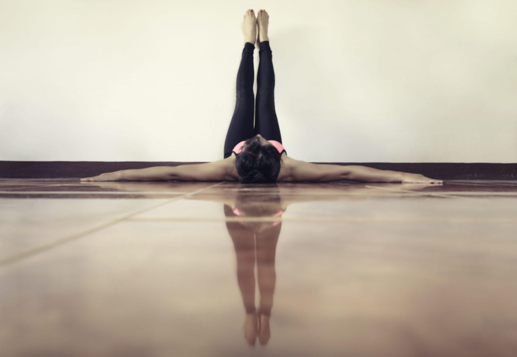 Legs up the wall pose / Inverted Lake Pose (Sanskrit terms: Viparita Karani)  - Better Day Yoga